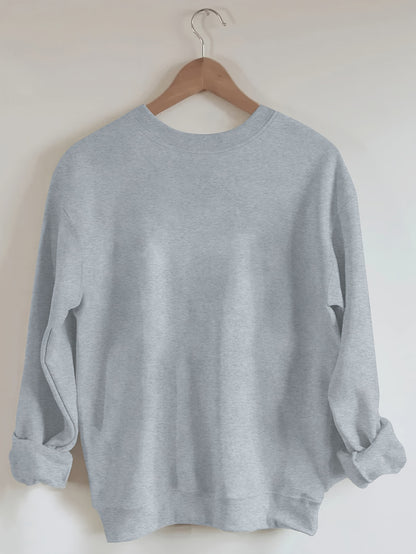 A cozy pink “Silly Goose” nurse sweatshirt featuring a cute duckling and bold CUFF ’EM slogan, perfect for winter shifts and everyday scrubs style.