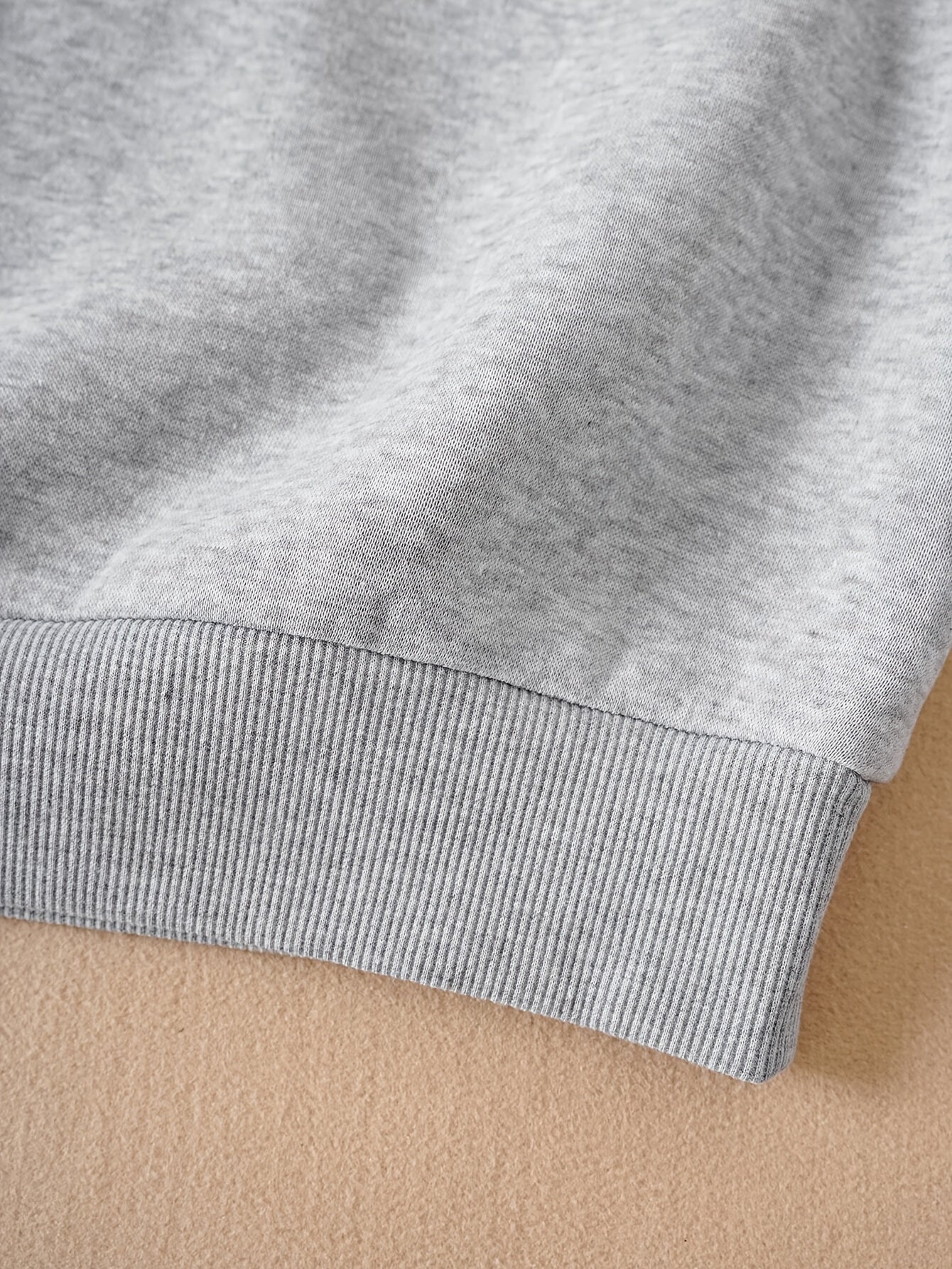 A cozy pink “Silly Goose” nurse sweatshirt featuring a cute duckling and bold CUFF ’EM slogan, perfect for winter shifts and everyday scrubs style.